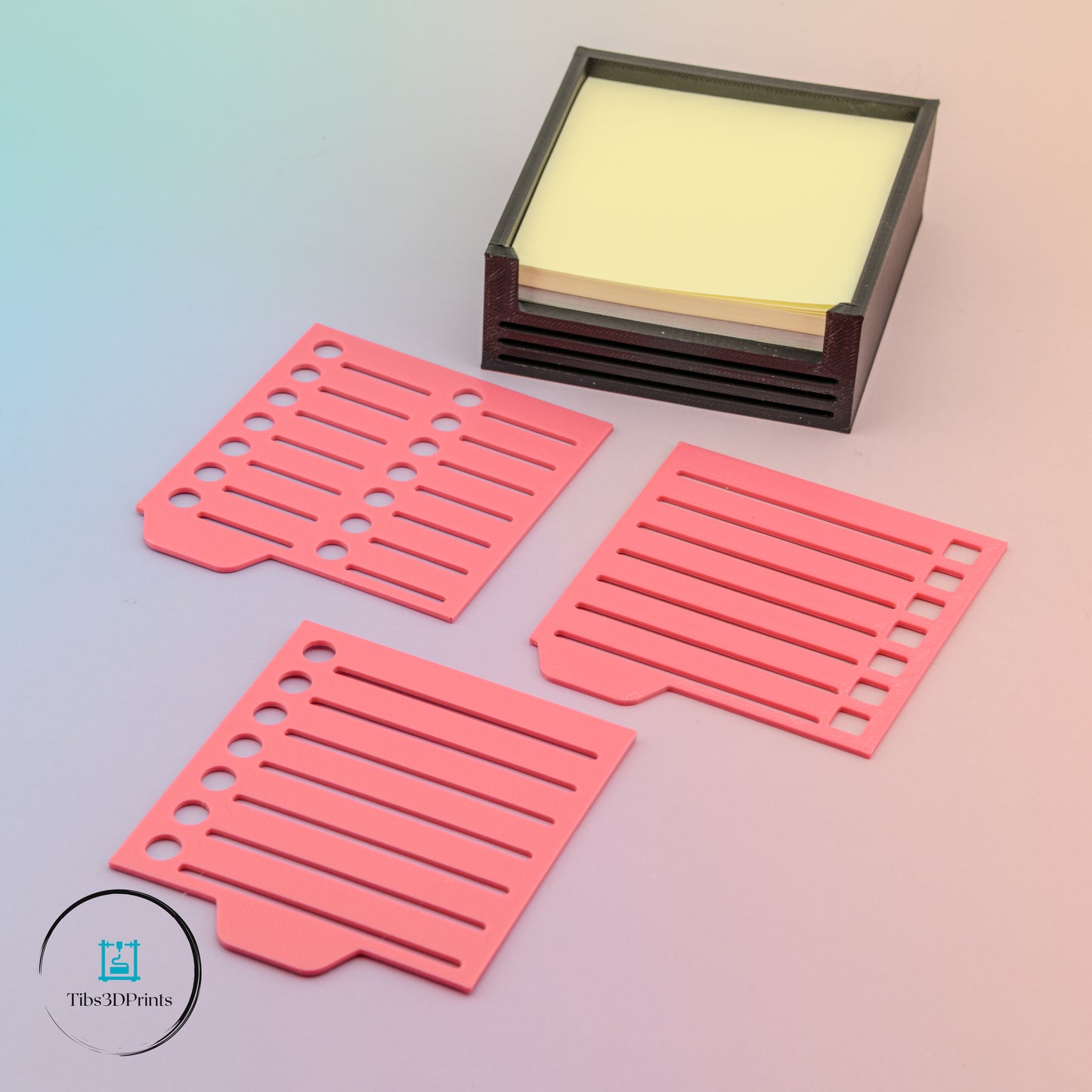 Post-it note holder with coral pink stencil attached